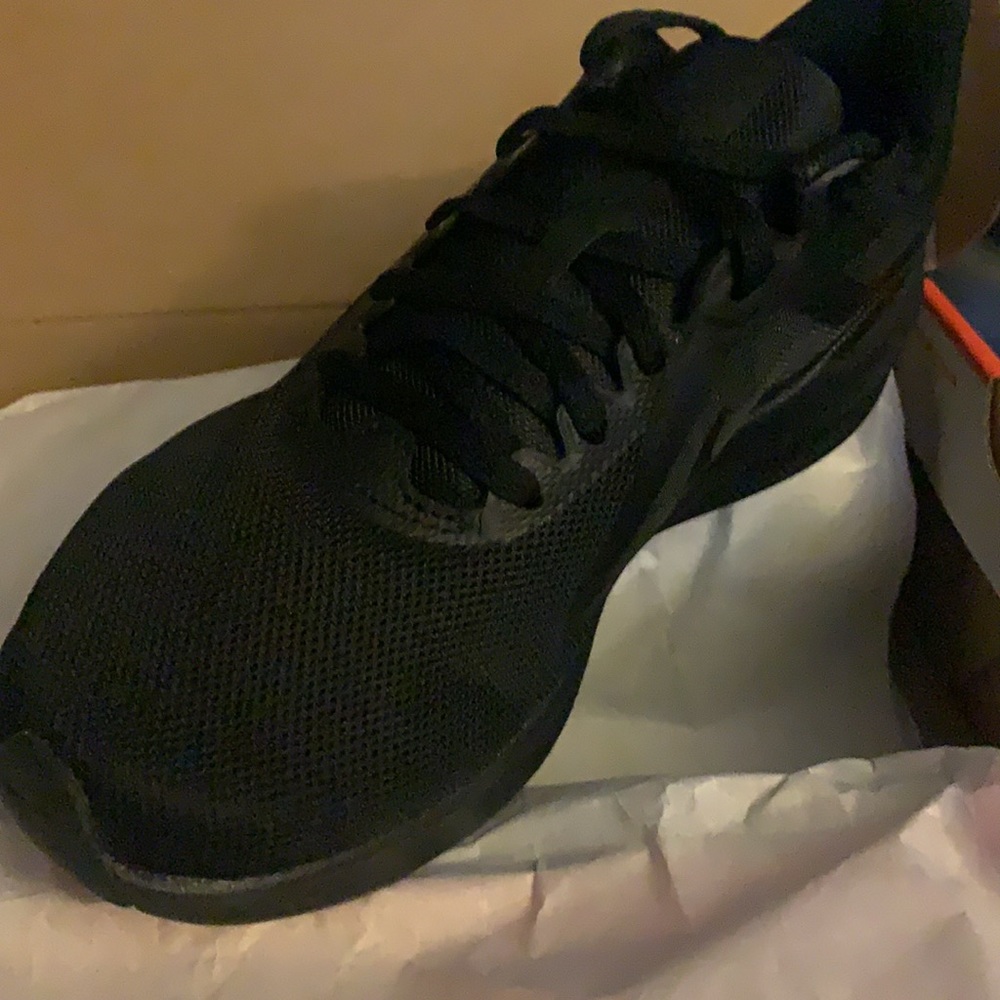 Women's black Nike shoe